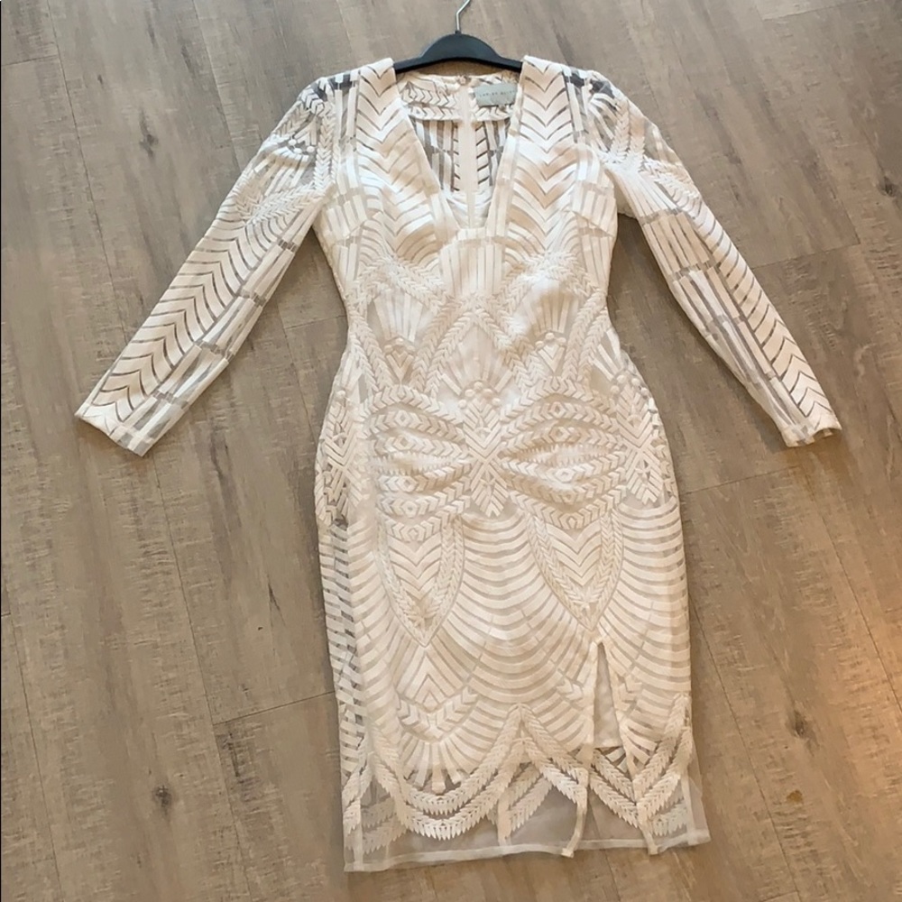 White long sleeved dress
